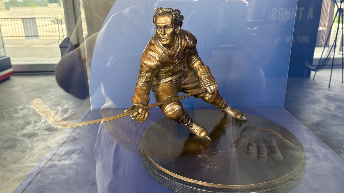 A bronze statue of hockey player Guy Lafleur.