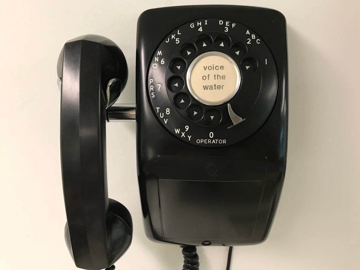 A black rotary phone.
