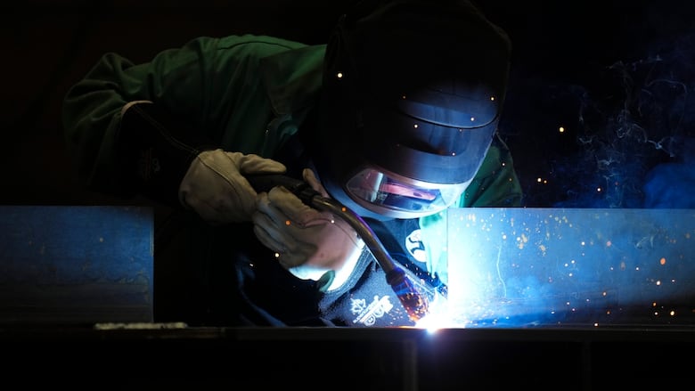 A welder works at Walters Group Steel fabrication plant in Hamilton, Ont., Wednesday, July 16, 2025.