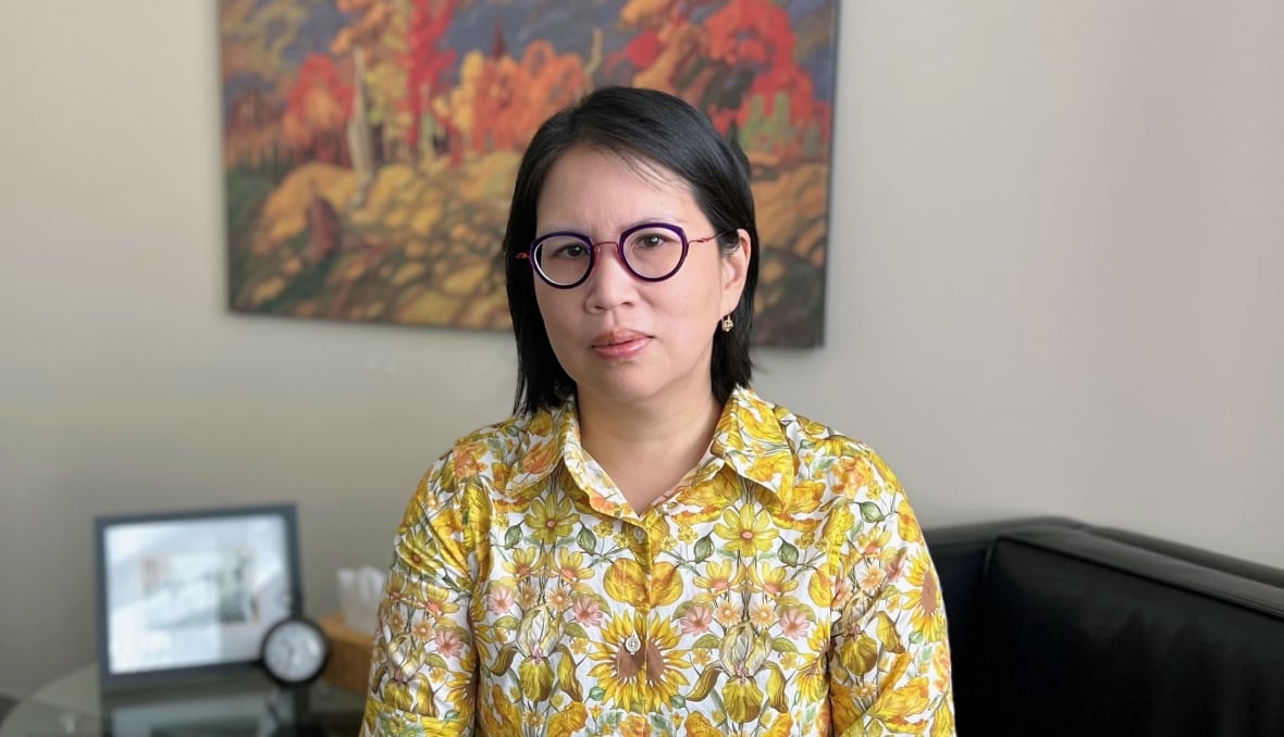 A woman in an office.