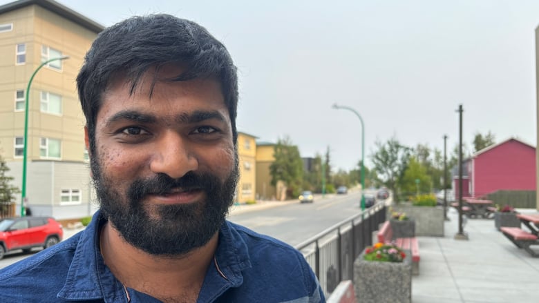 A man looking into camera.