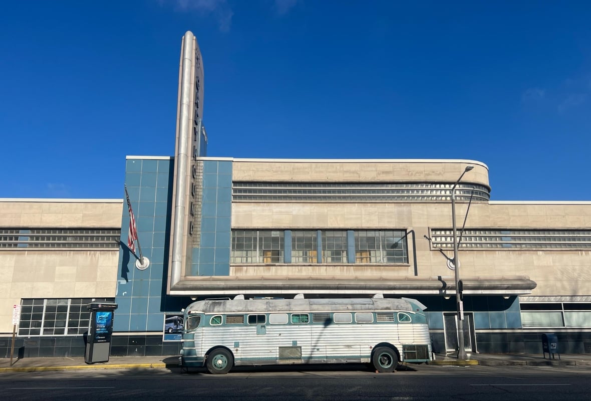 A classic, 1947 Greyhound bus parked outside the 