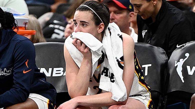Indiana Fever guard Caitlin Clark sits on the bench after being taken out of a July 15, 2025 WNBA regular-season game with a possible injury during the second half against the Connecticut Sun at the TD Garden in Boston, Massachusetts.