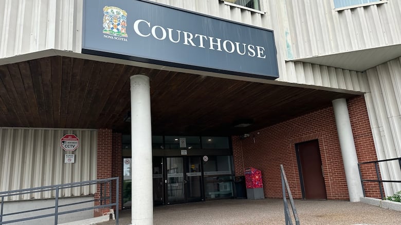 A front entrance with a sign that says 'Courthouse' is shown.