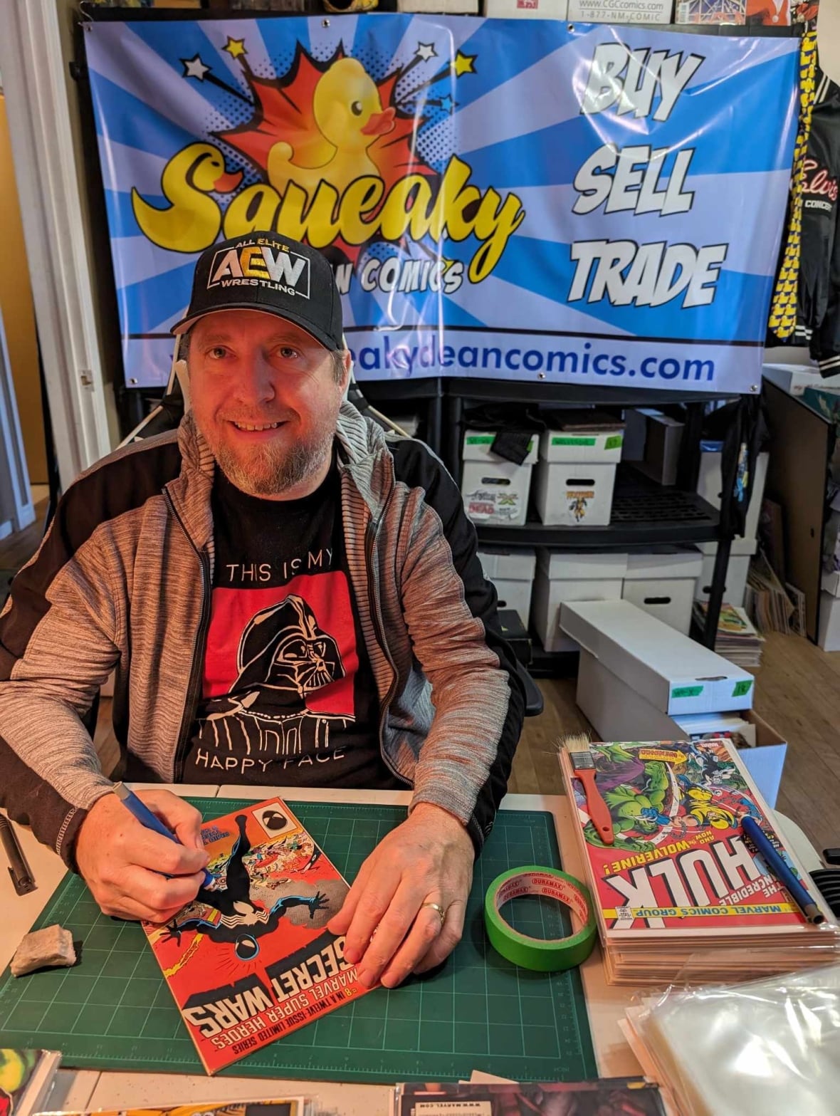 Man smiling with comic