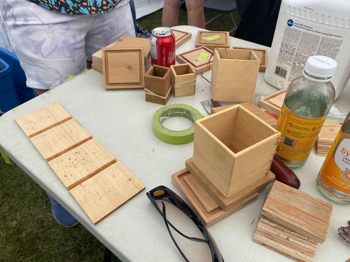 Small wooden boxes on a table.