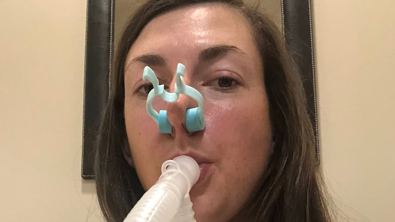Brinn Edgington testing her lung capacity.