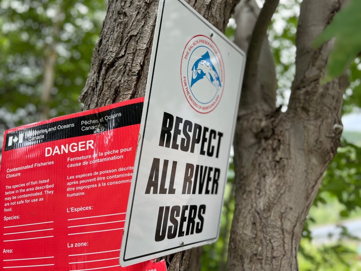 A close up of a sign that says 'Respect all river users'