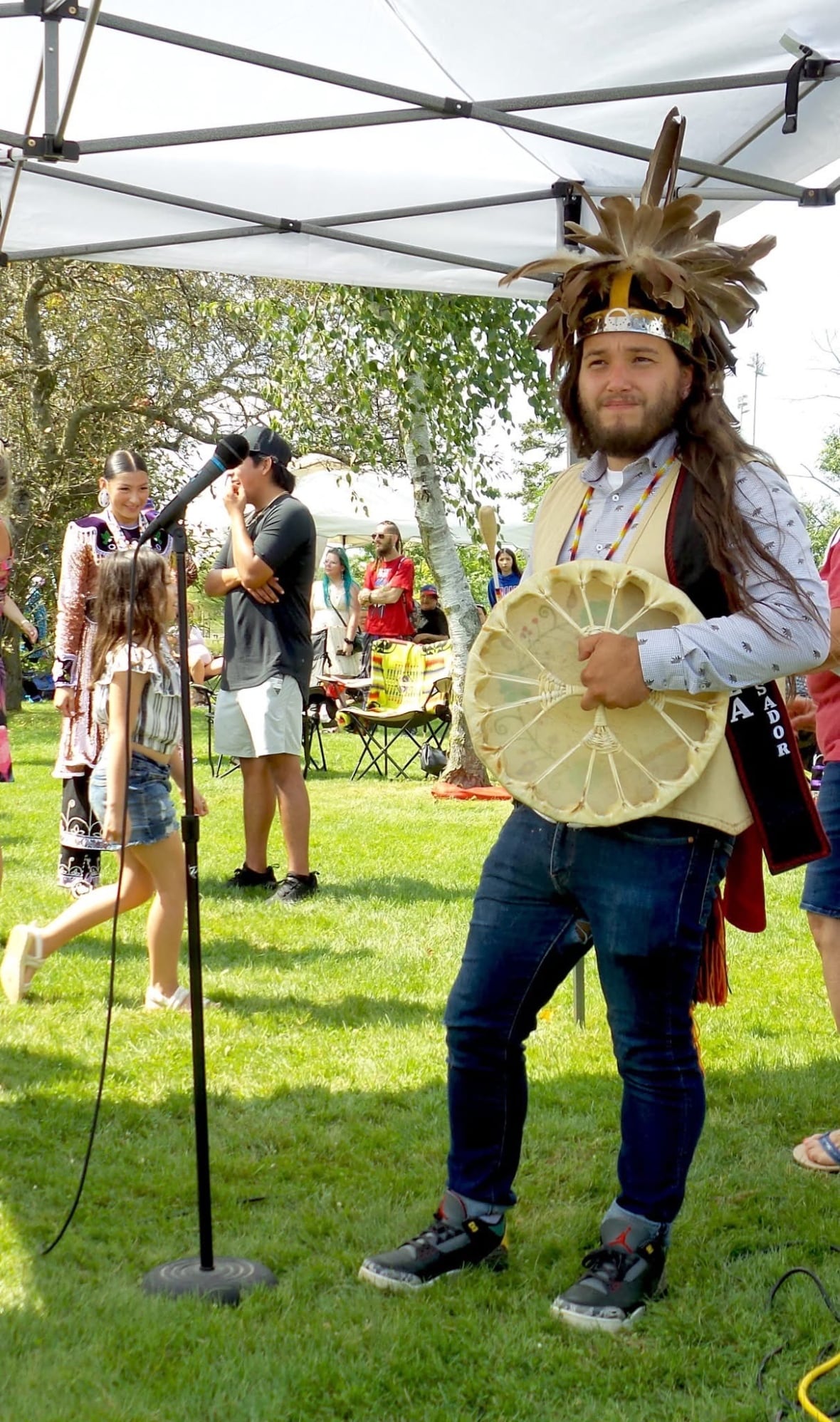 Man with hand drum.
