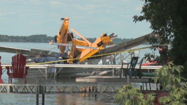 A teenage boy died after a plane crashed into Lake Scugog, about 93 kilometres northeast of Toronto, said Durham Regional Police. Debris of a crashed upside-down yellow seaplane on a dock in a lake.