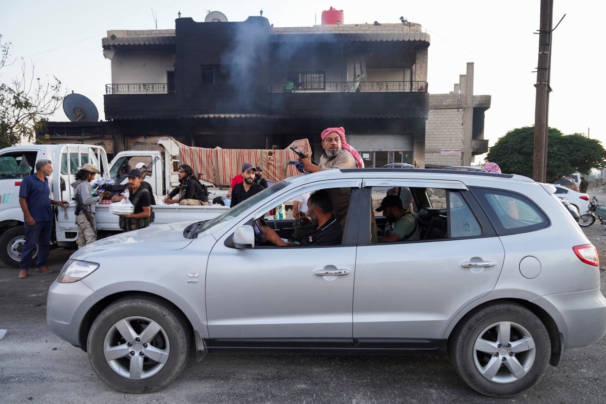 Fighters in a car. 