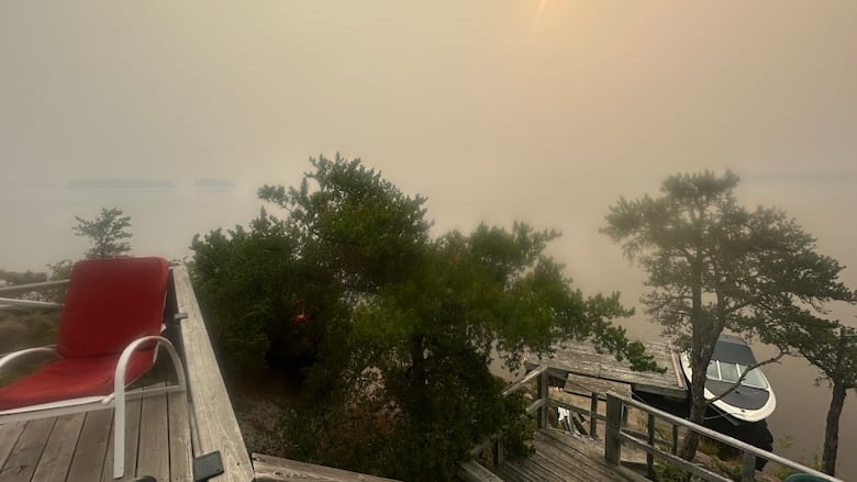 Smoke is visible in the air in a dock.