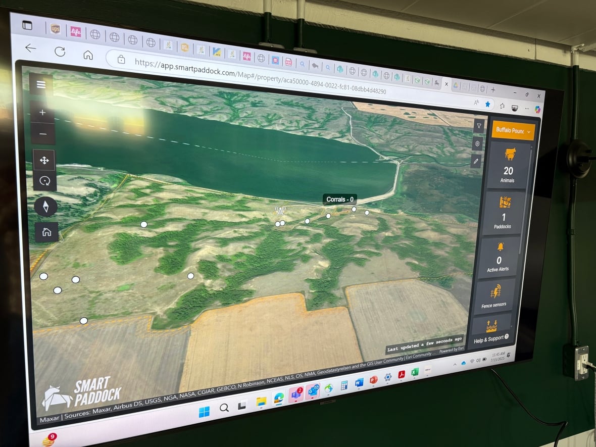 A TV screen displays bison as little white dots on a map at the Buffalo Pound Provincial Park visitor centre.