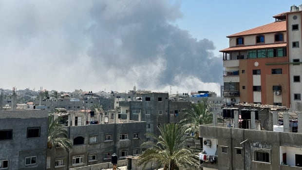 Smoke rises in a Gaza city.