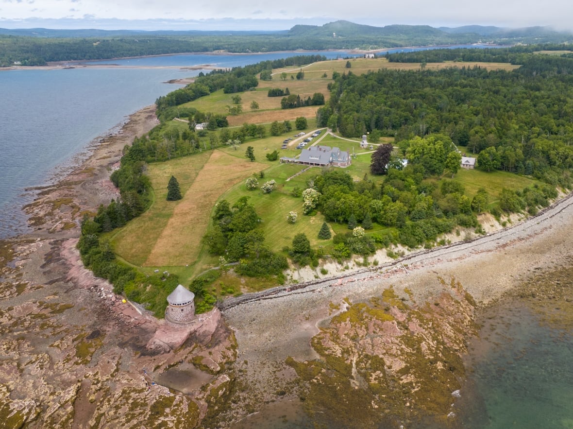 Birds eye view of and island in the middle of a bay.