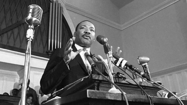 A 1960 file photo shows Rev. Martin Luther King Jr. speaking in Atlanta.