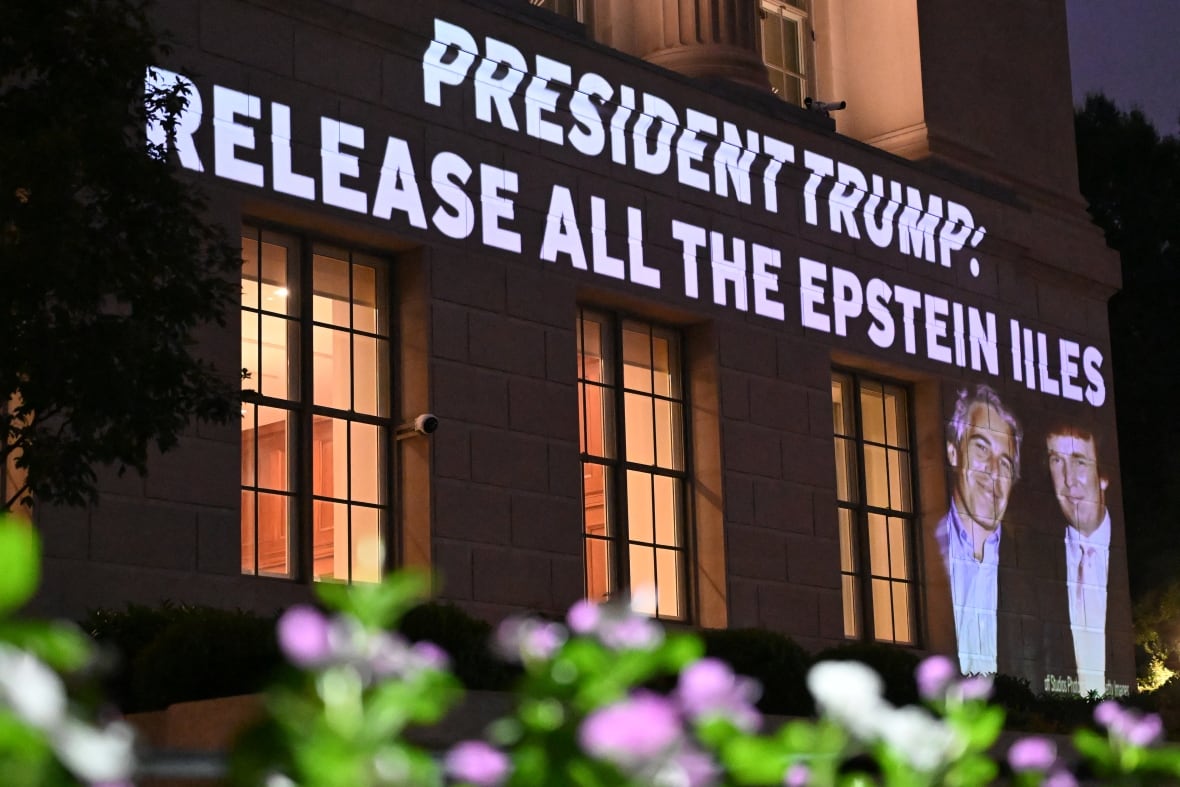 A message calling on President Donald Trump to release all files related to Jeffrey Epstein is projected onto the US Chamber of Commerce building across from the White House in Washington, DC, on July 18, 2025.