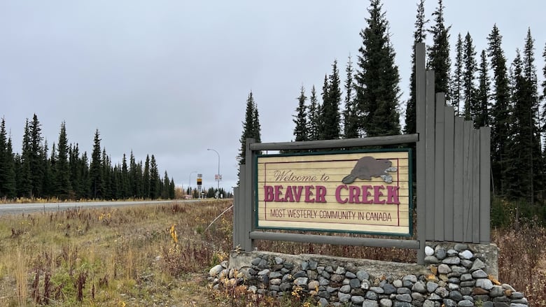 A roadside sign welcomes people to Beaver Creek.