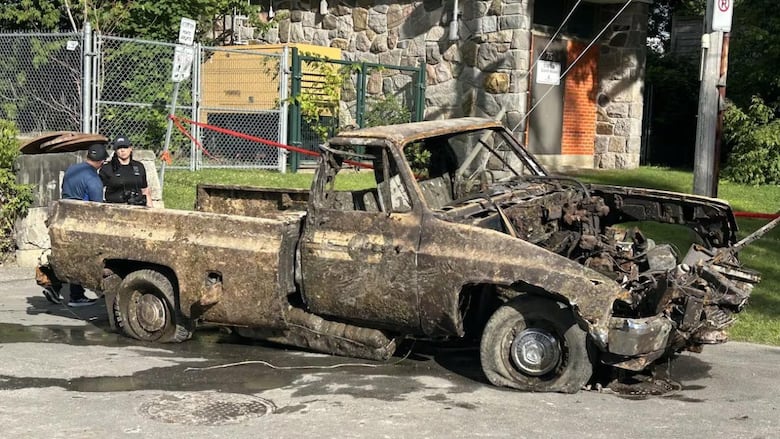 Destroyed rusty and muddy pickup truck