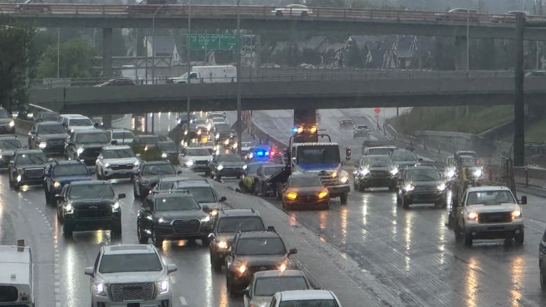 Traffic was thick Tuesday morning on Glenmore Trail as drivers contended with resurfacing challenges.