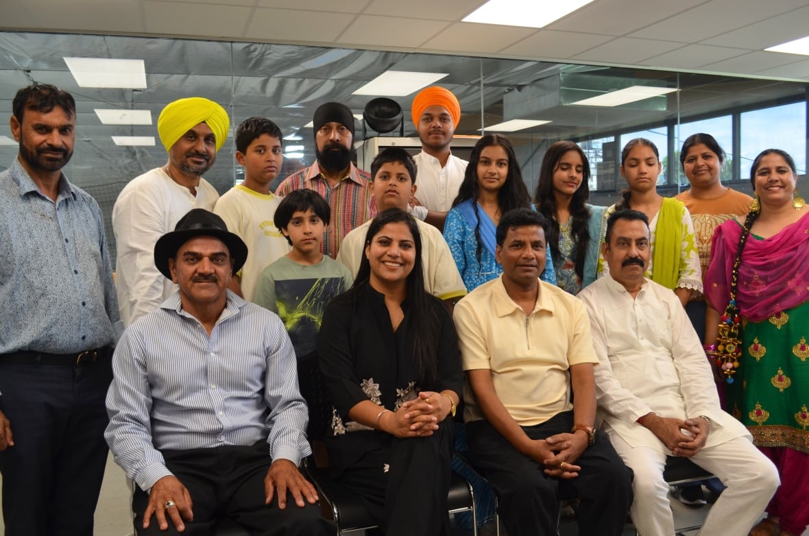 A group of people pose for a picture.