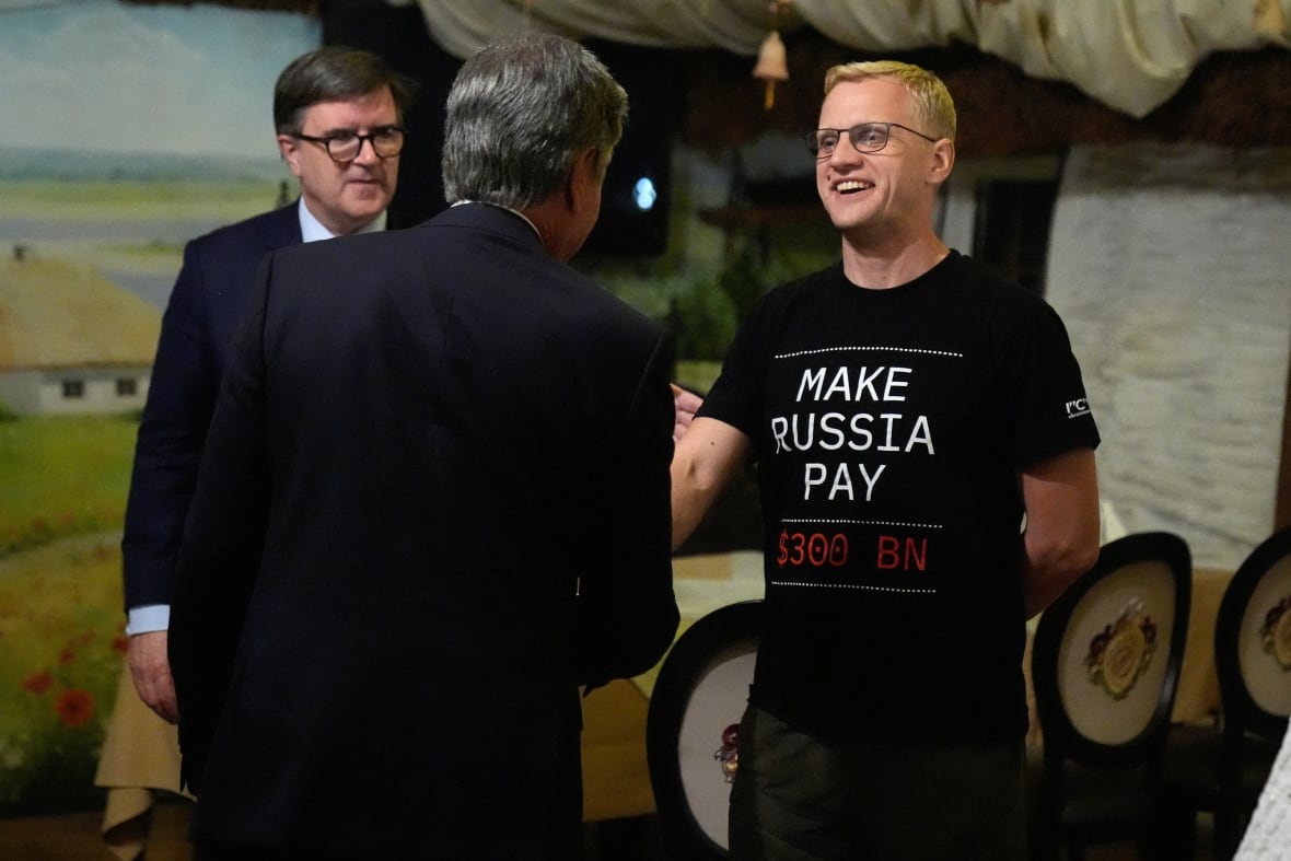 Anti-corruption campaigner Vitaliy Shabunin greets U.S. Secretary of State Antony Blinken at an even in Kyiv, Ukraine on September 11, 2024. Earlier this month, Shabunin was accused of fraud and evading military service. His supporters believe the accusations are politically motivated. 