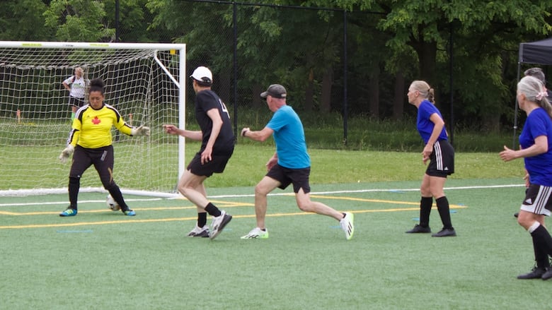 People play soccer.