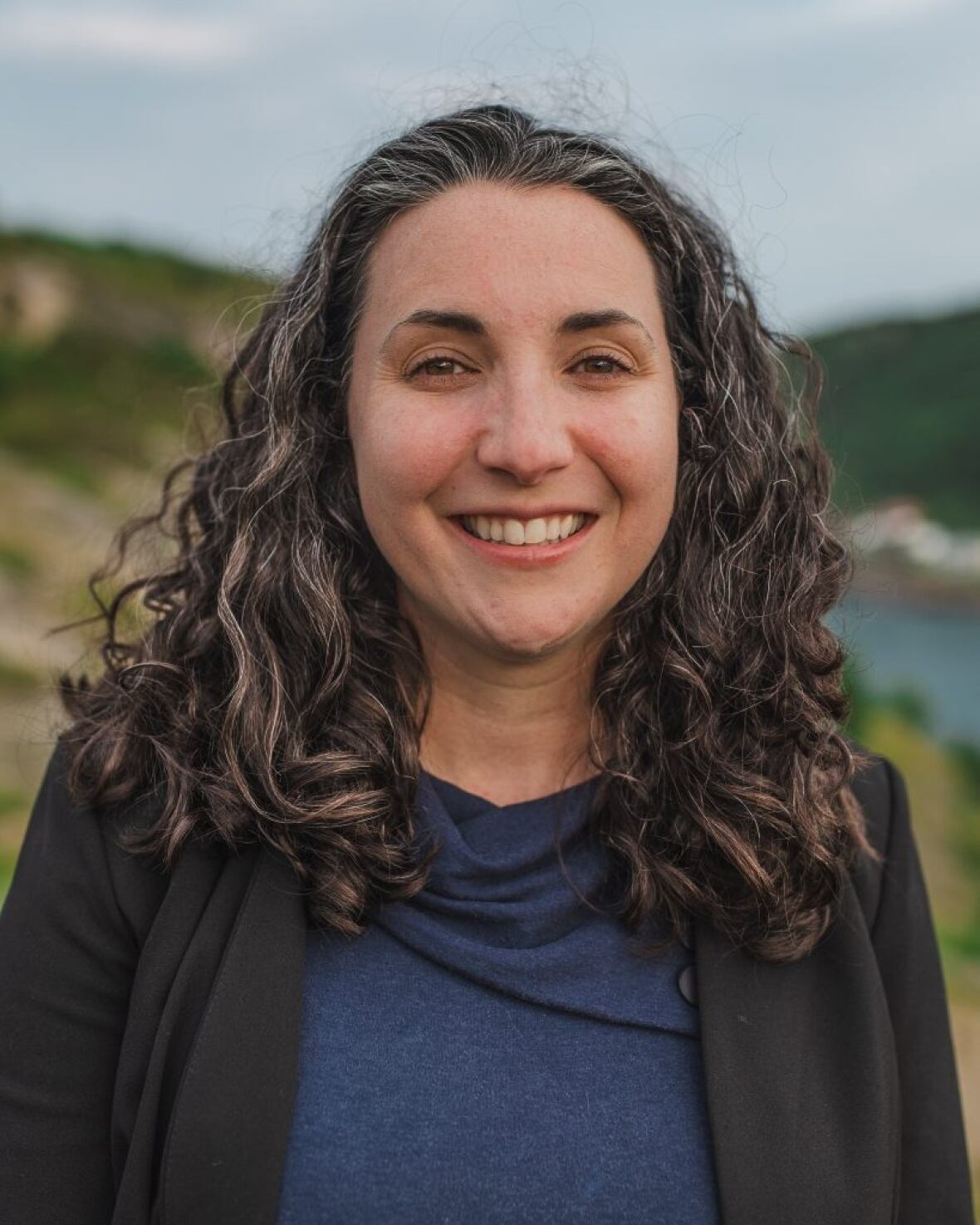 A woman smiling.