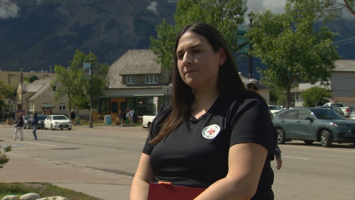 A woman stands in the street in the municipality of Jasper.