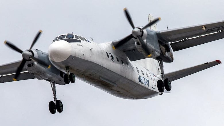 A closeup of a passenger airplane is shown.