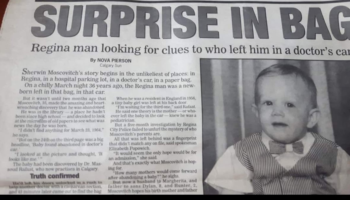 A newspaper article shows a baby, with the headline, Surprise in a Bag.