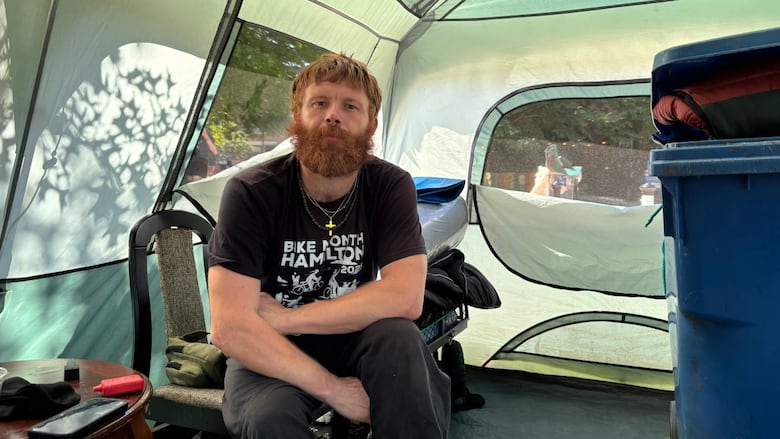 A man inside a tent
