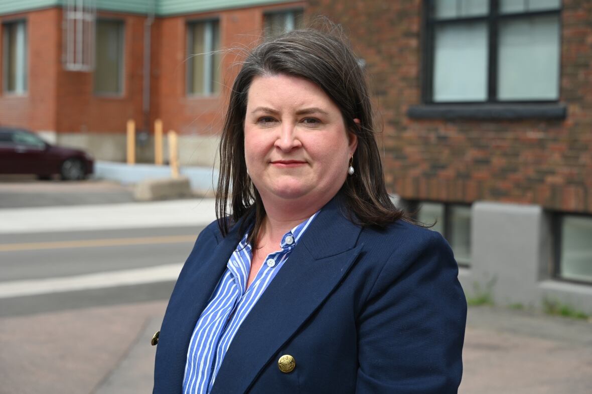 A women in a blue blazer
