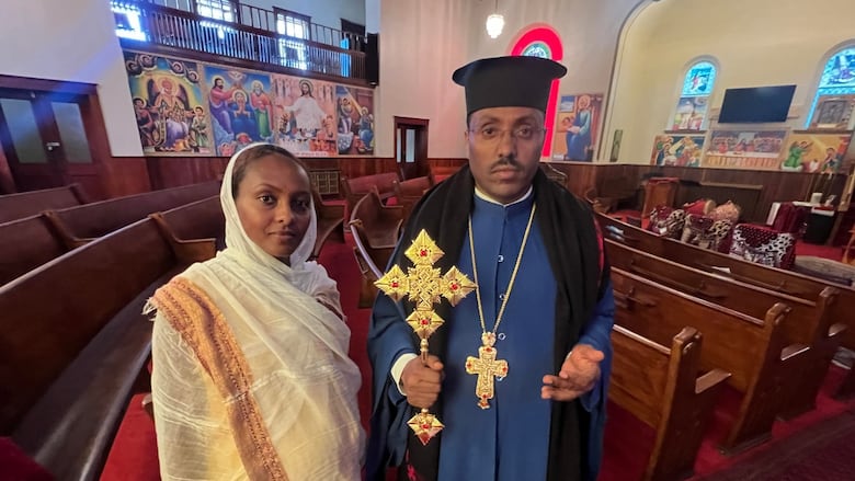 Bilen Araya, left, is the church's spokesperson. With her is church leader Megabe Haddis Quomos Abba Tmelessan Zemichael. The church is looking to raise $100,000 through an online fundraising campaign to cover the cost of fixing the roof of the century-old building in Old East Village.