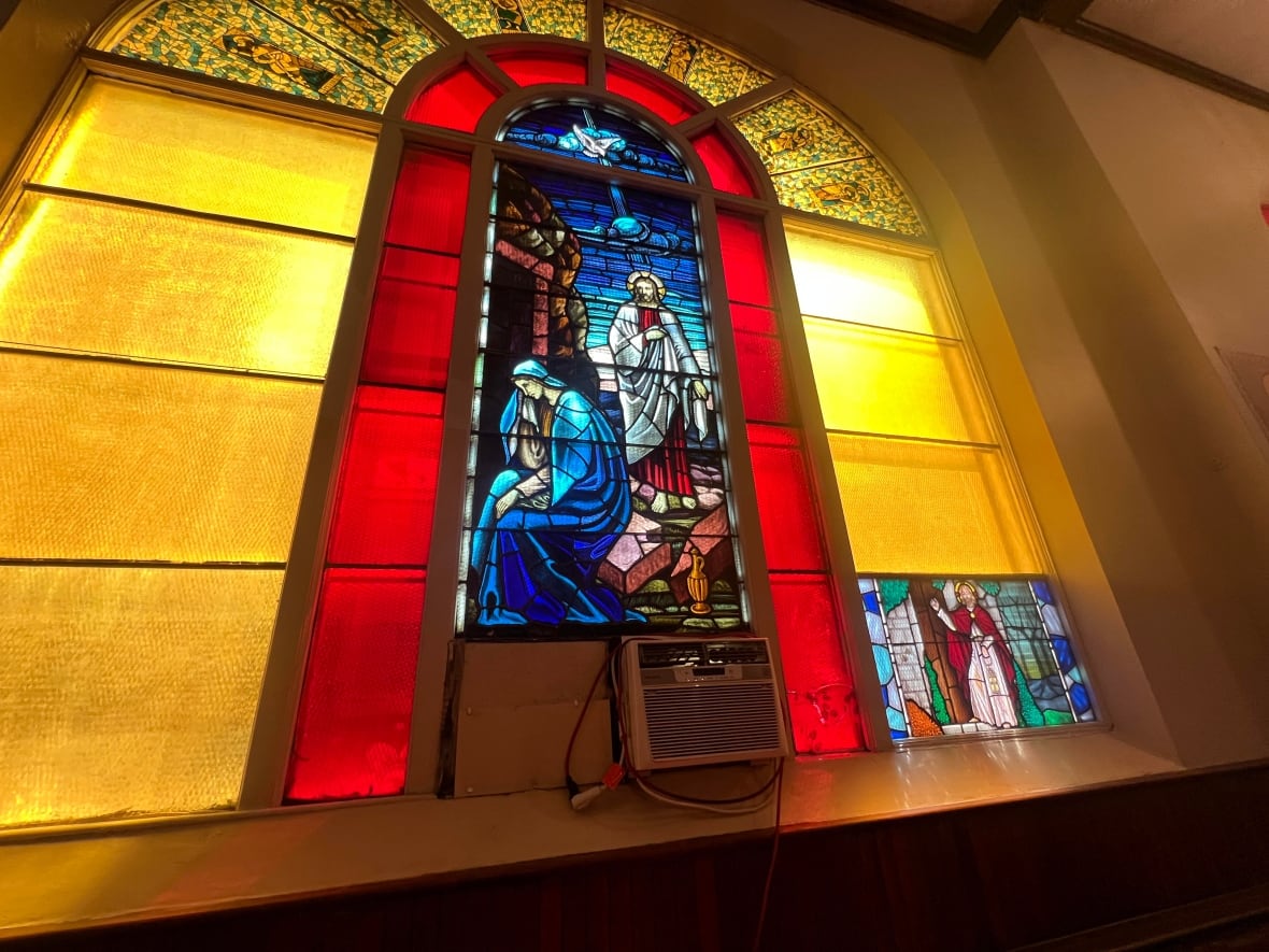 The church features original stained glass windows in the main chapel.