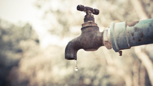 A faucet with a water drop 