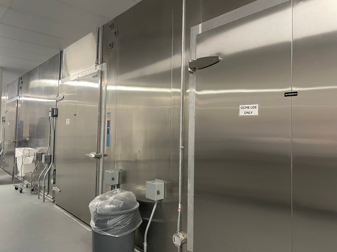 A wall of metal with doors.