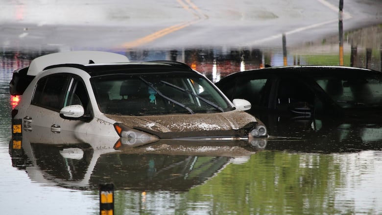 Cars trapped in water.