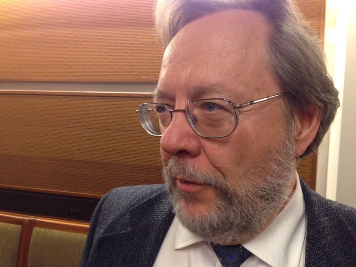 A bearded man with glasses