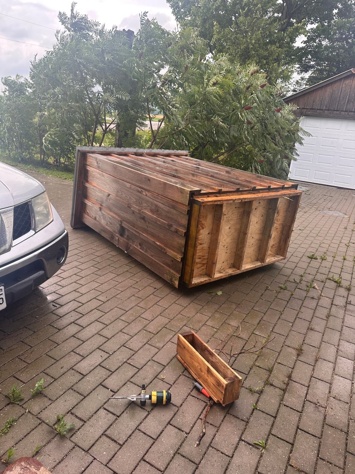 Deborah Caira's vegetable stand, which by her estimation ways upwards of 400lbs., was thrown across her property and landed beside her vehicle, she said.