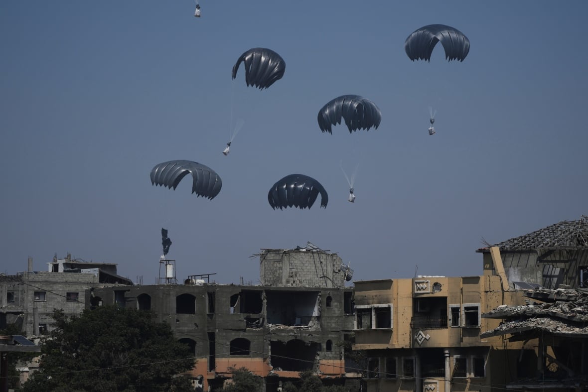 People's help is decorated with a plane over Gaza.
