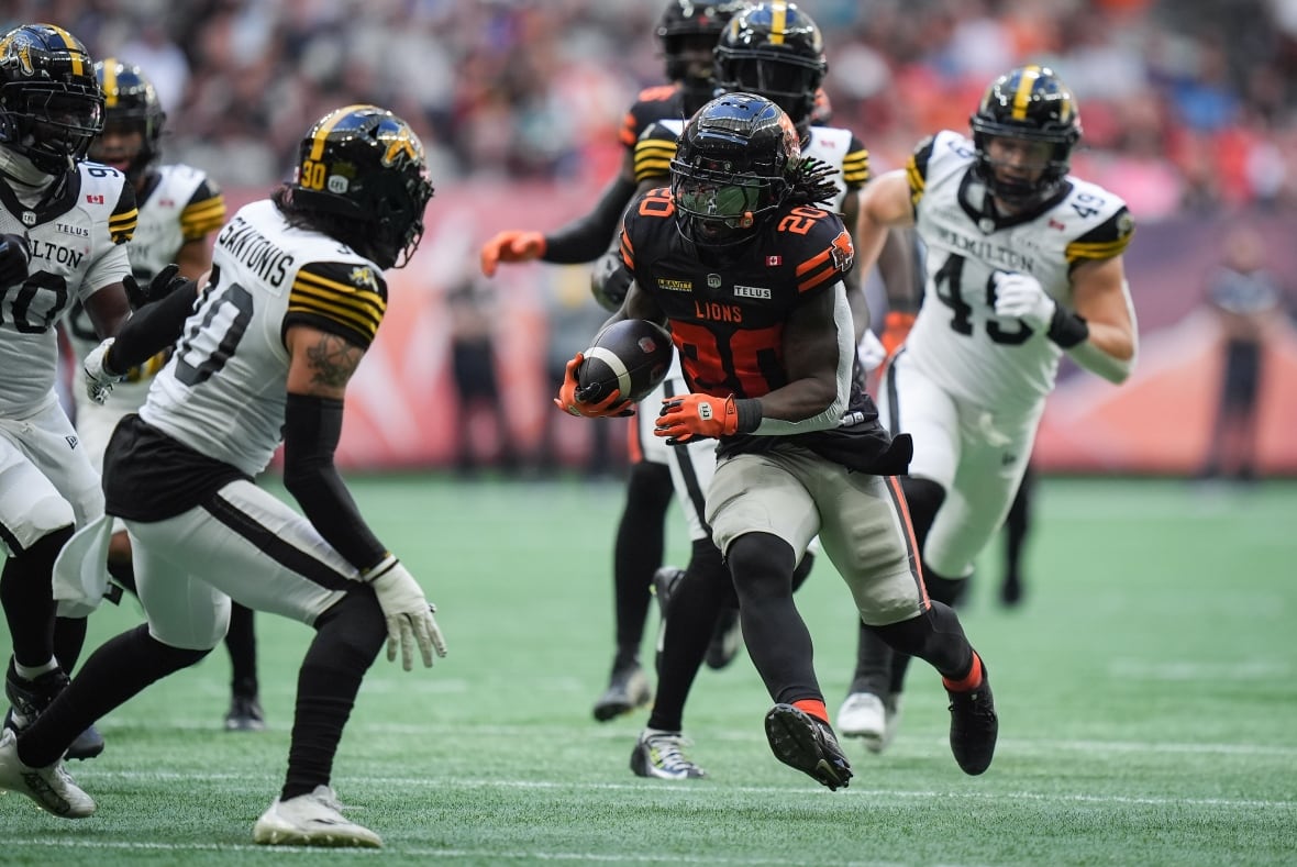 Action shot of men playing football