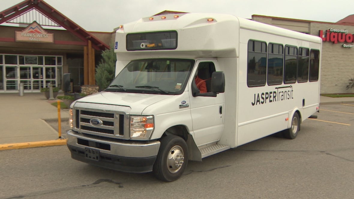 The regional commuter bus fits in front of the Parks West Mall in Hinton.