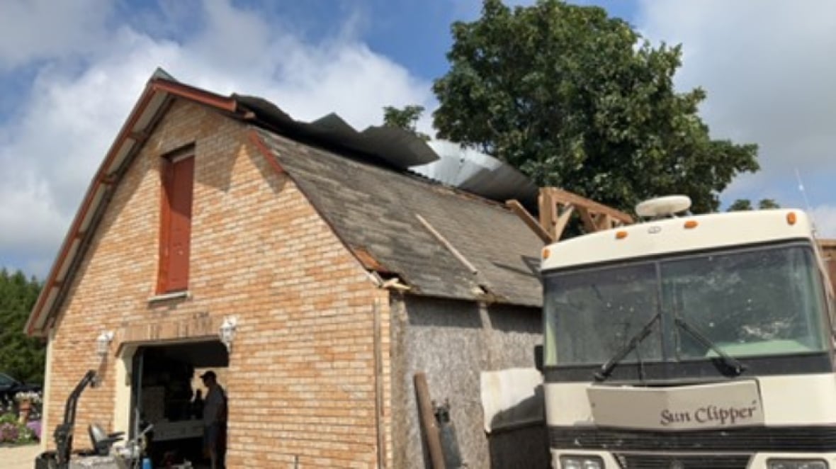 Damage to a building on Sharpes Creek Line in Huron County, caused by the second of three tornadoes spawned by a supercell thunderstorm that passed through the region on Saturday evening.