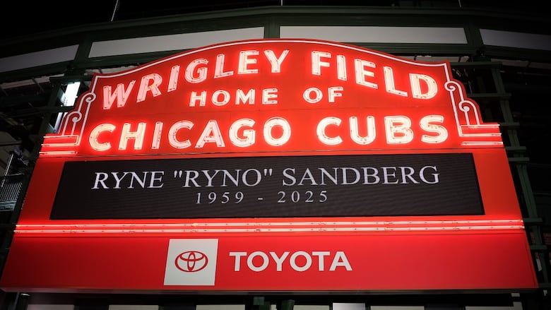 A marquee reads 'Ryne "Ryno" Sandberg 1959-2025' 
