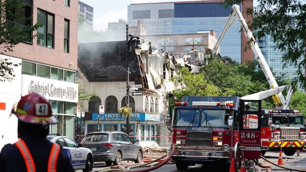 Fire destroys 140-year-old building in downtown Montreal | CBC News