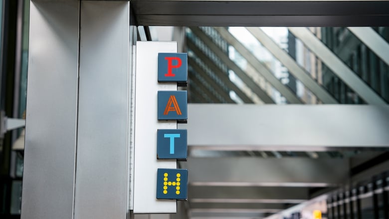 A sign with the acronym PATH on the side of a building.