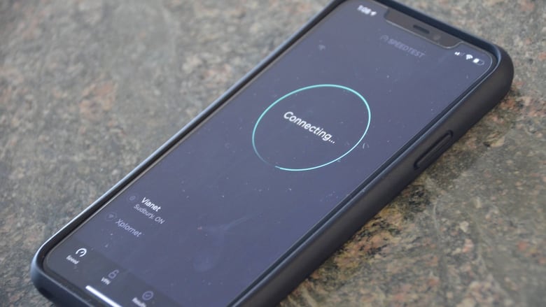 A cellphone on a counter that is connecting... 