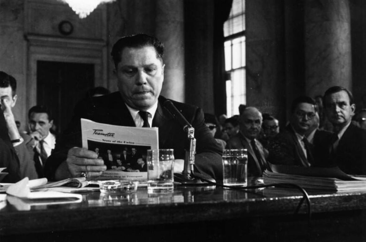 A man at a hearing.