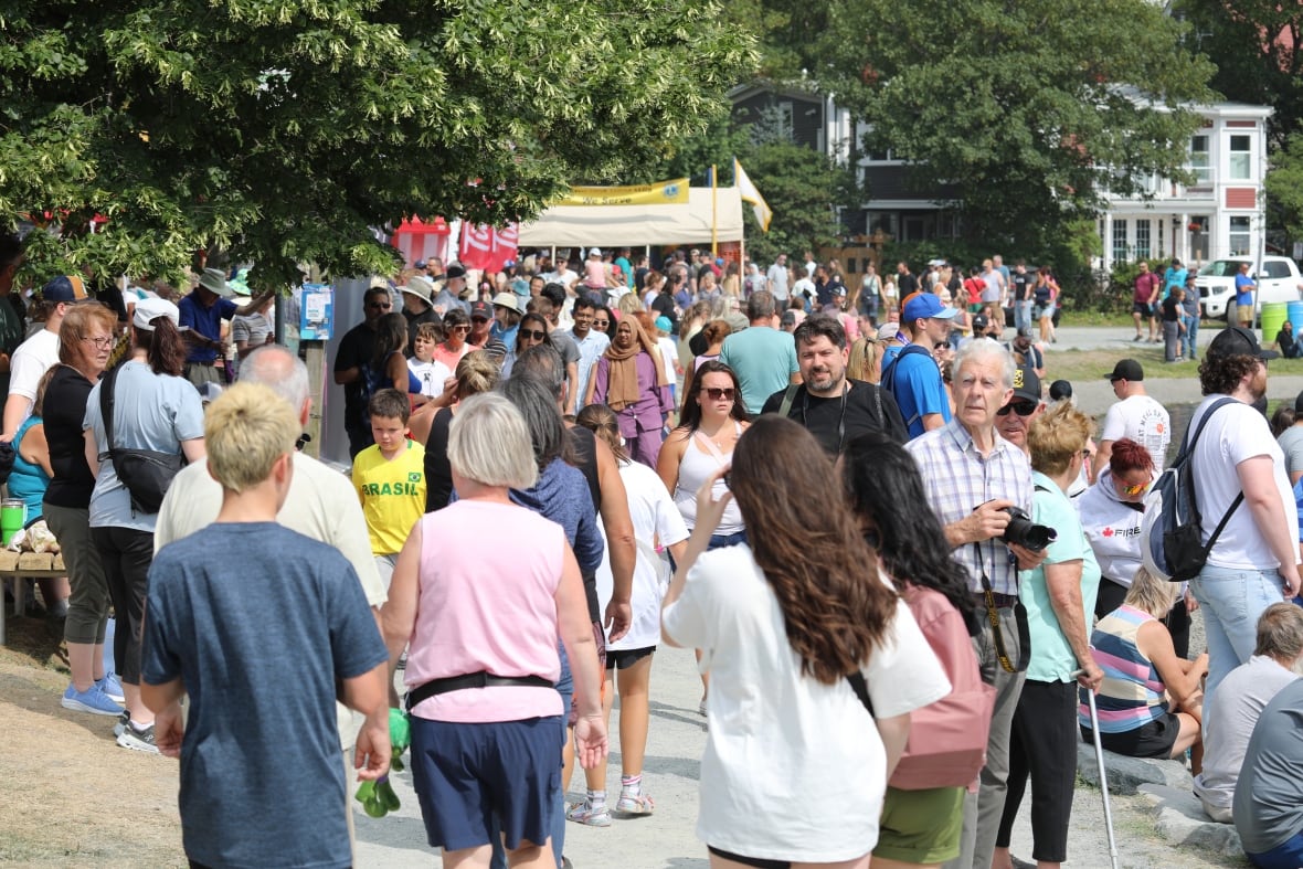 Crowd of people walking.